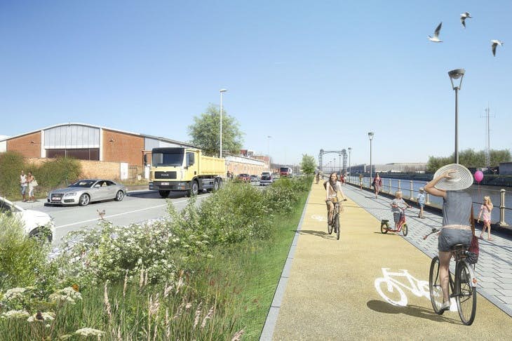 Cyclistes roulant sur une piste cyclable longeant le canal de Bruxelles